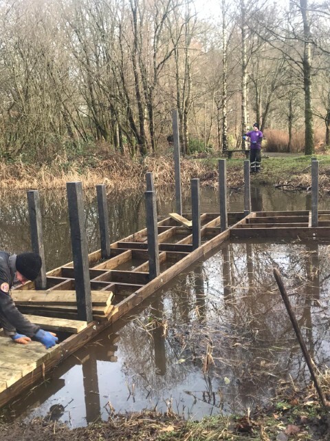 Decking being added over the composite subframe